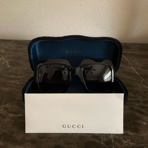 Gucci Sunglasses Style: GG0053S, Elegantly Oversized in the Color Black
